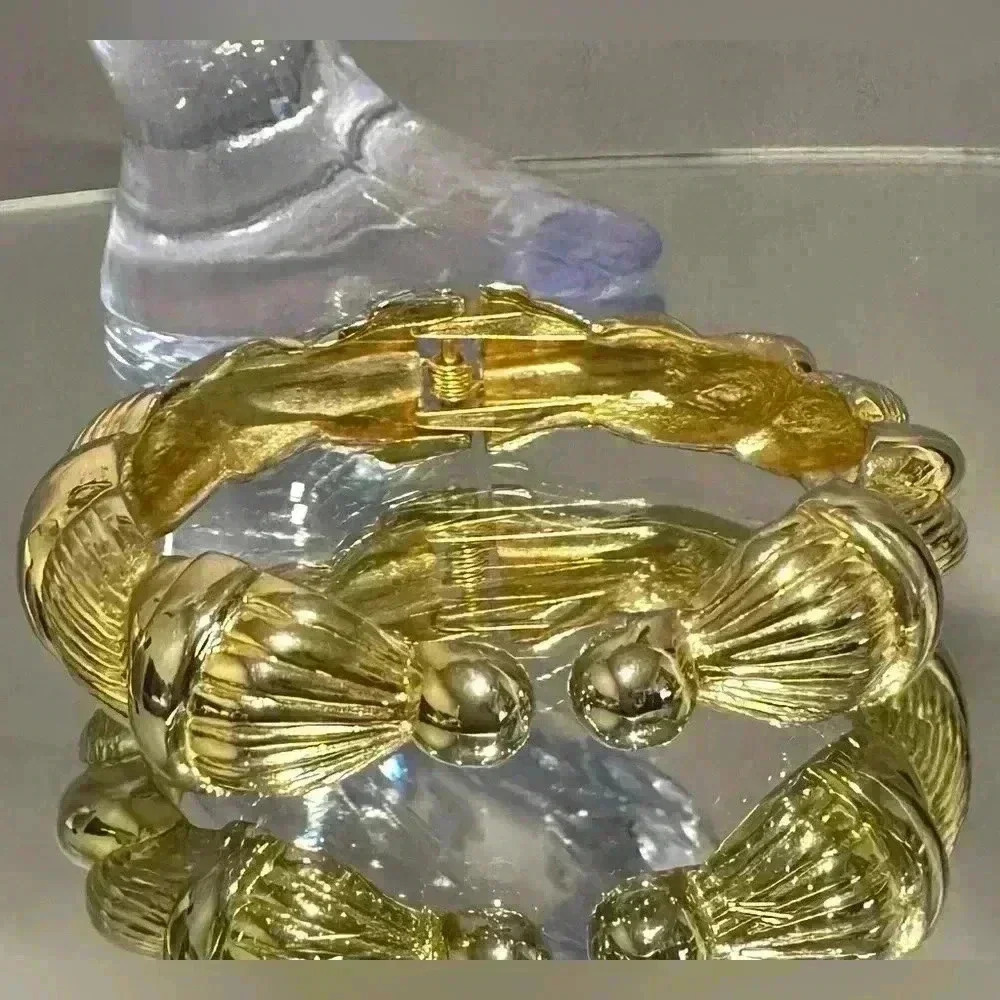 $6 Add-On | Women’s Gold tone  metal hinged bangle bracelet